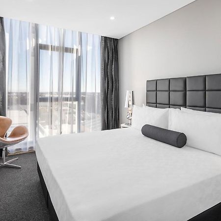 סידני Meriton Suites Mascot Central מראה חיצוני תמונה A bedroom at the hotel