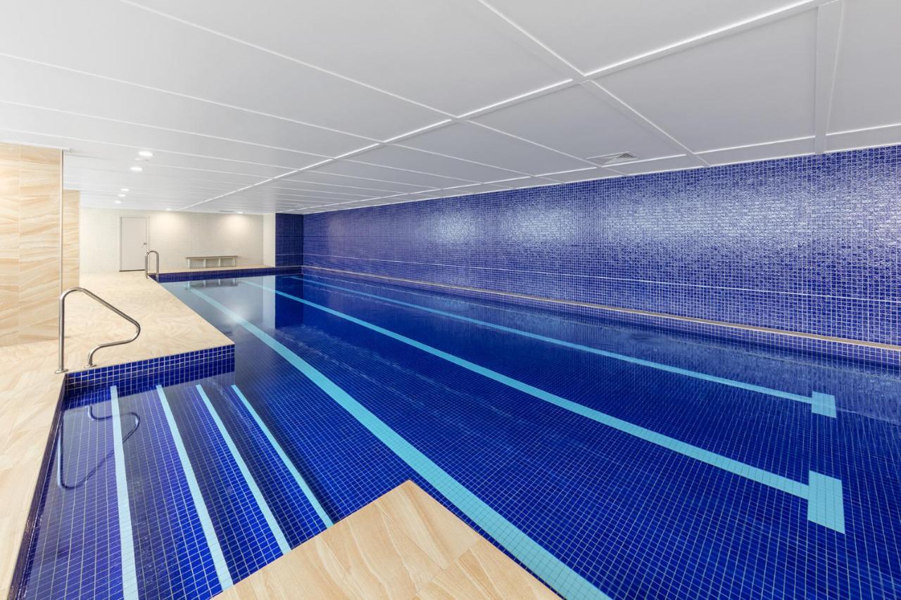 סידני Meriton Suites Mascot Central מראה חיצוני תמונה The pool at the 2012 Commonwealth Games Village